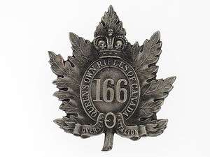 Canada. WWI 166th Infantry Battalion Cap Badge REPROD.  