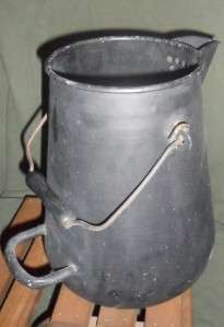 This Vintage or older Enamelware Coffee Pot or Water Pitcher, is 
