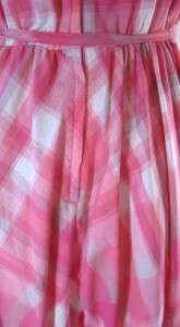 LOVELY This rockabilly style dress features a feminine pink plaid 