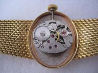 NOS NEW SWISS MADE 18K SOLID GOLD LE MONDE WATCH 1960S  