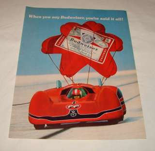 1975 Budweiser ad page ~ RACE CAR WITH PARACHUTE  