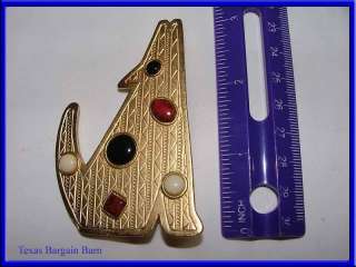 This auction is for a pretty JJ, costume jewelry pin. It is shaped 