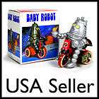 TIN TOY ROBOT on TRICYCLE Wind Up Bike Baby Retro NIB Space Age NEW 