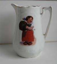 Vintage Childs German Girl baby creamer pitcher  