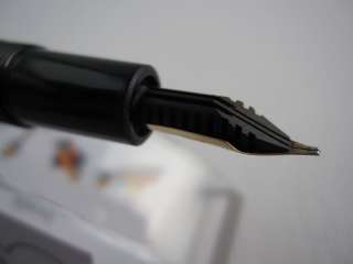12 5cm in length a classic mont blanc logo on the top of pen cap 