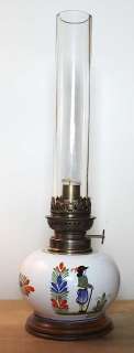   this beautiful old fashioned h b henriot quimper oil lamp it features