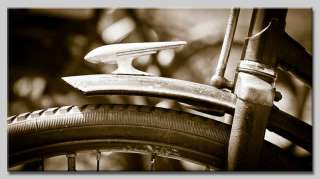 Leinwand Bild Opel Fahrrad Kühlerfigur Oldtimer Sepia  