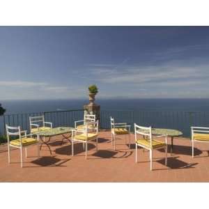  Empty Tables and Chairs on the Balcony of a Hotel, Ceasar Augustus 