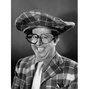 Phil Silvers Wearing Large Glasses, Plaid Cap and Suit in Top Banana 