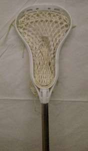This lacrosse stick is in very good used condition with little wear 