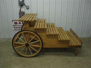 You are looking at a 48 wood wagon bakery/bread display rack w/ 5 